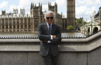 Prince Charles Presents Ralph Lauren With Honorary Knighthood at Buckingham Palace